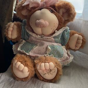 Xavier 1985 Furskins Persimmon’s collection bear original clothing  no shoes . V